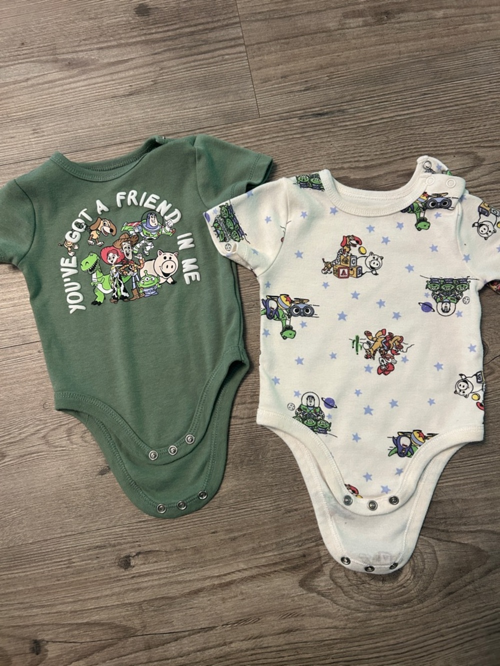 Pair of Toy Story onesies